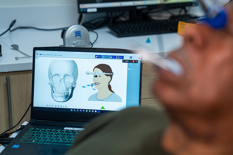 Patient learning what to expect during dental implant treatment